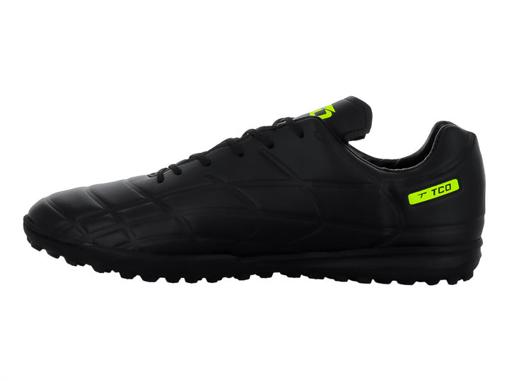 Zapato de fútbol Leon Trucco color negro con detalles en amarillo neón y suela para pasto sintético.