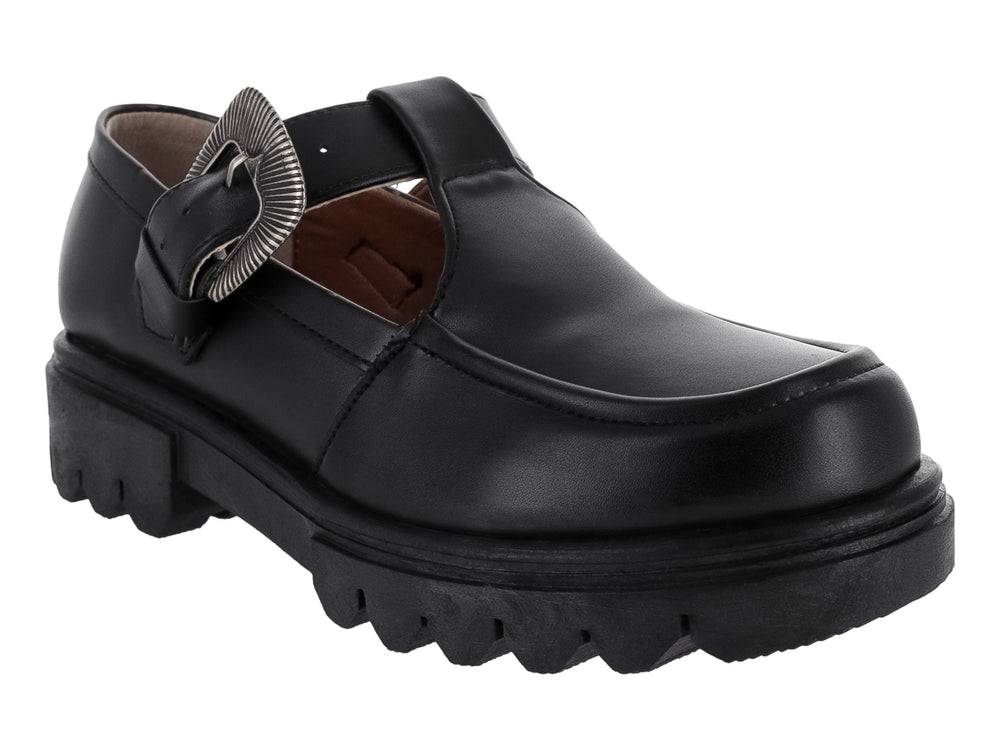 Zapato plano negro estilo Mary Jane con suela track y hebilla decorativa plateada.