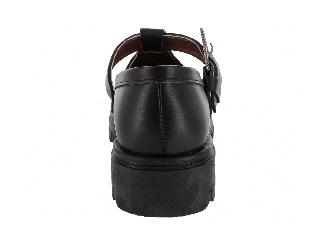 Zapato plano negro estilo Mary Jane con suela track y hebilla decorativa plateada.
