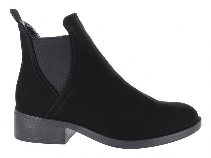 Botín negro estilo Chelsea para mujer con panel elástico lateral y tacón bajo.