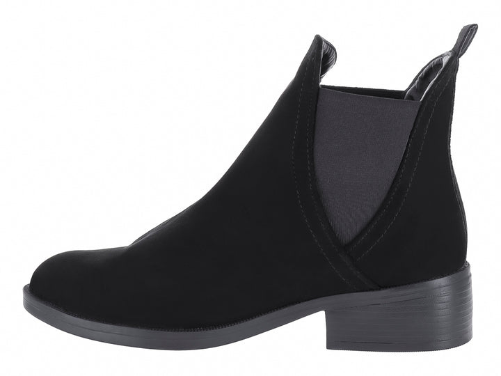 Botín negro estilo Chelsea para mujer con panel elástico lateral y tacón bajo.