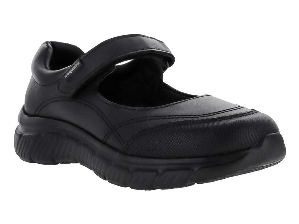 Zapato negro para niño o niña con cierre de correa velcro y suela robusta sobre fondo blanco.
