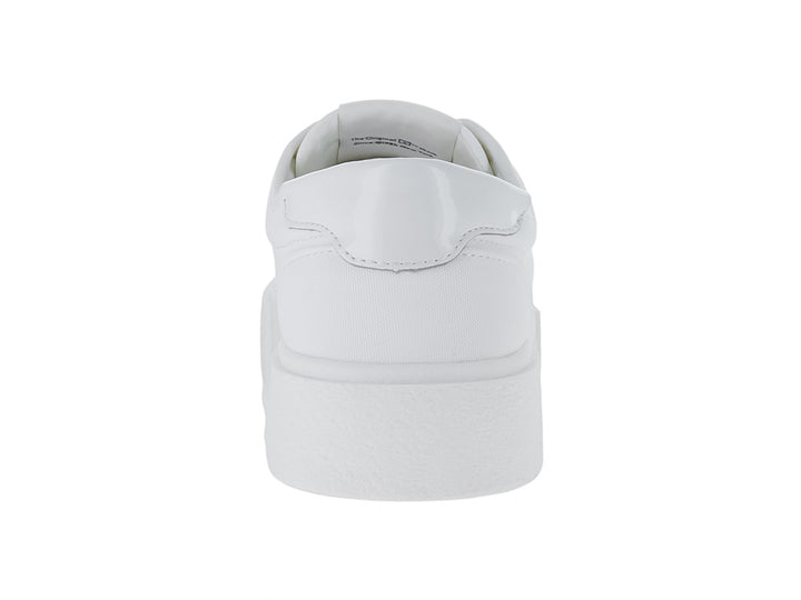 Tenis Tommy Hilfiger color blanco con suela de plataforma ancha y cordones.
