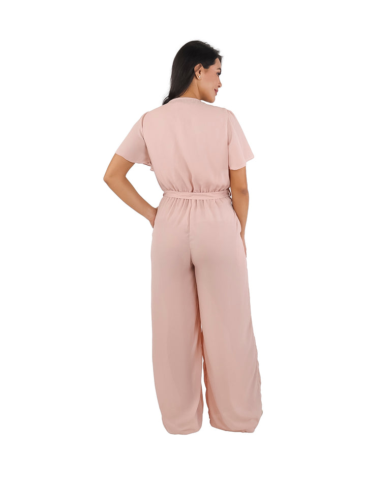 Conjunto de blusa con volantes y pantalón ancho en color rosa para mujer.