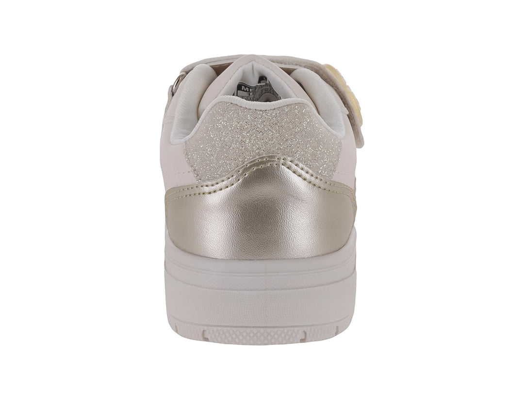 Tenis color beige con detalles en dorado brillante y suela blanca ancha.
