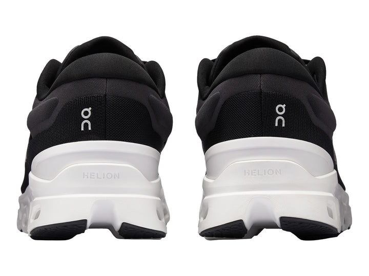 Tenis deportivos On Cloudstratus 3 color negro con suela blanca y diseño ergonómico.
