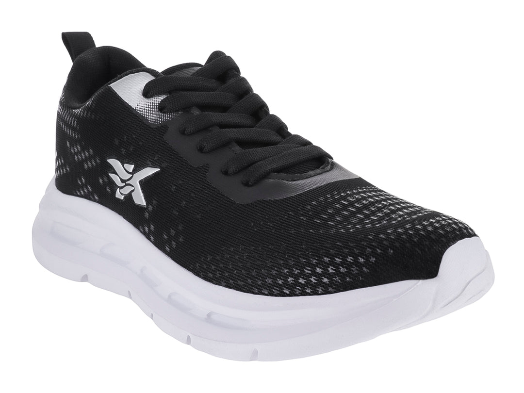 Tenis deportivos marca Makena en color negro con suela blanca y detalles en malla.