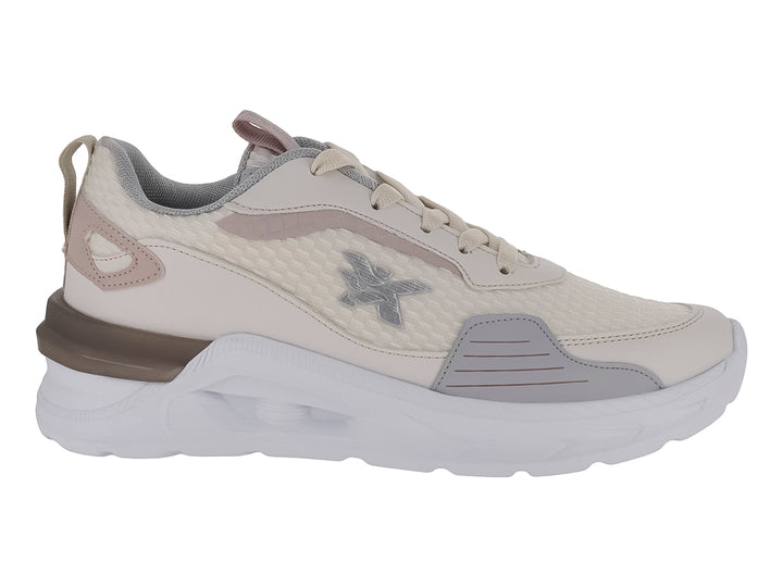Tenis deportivos MAKENA color latte con suela blanca y detalles en gris.