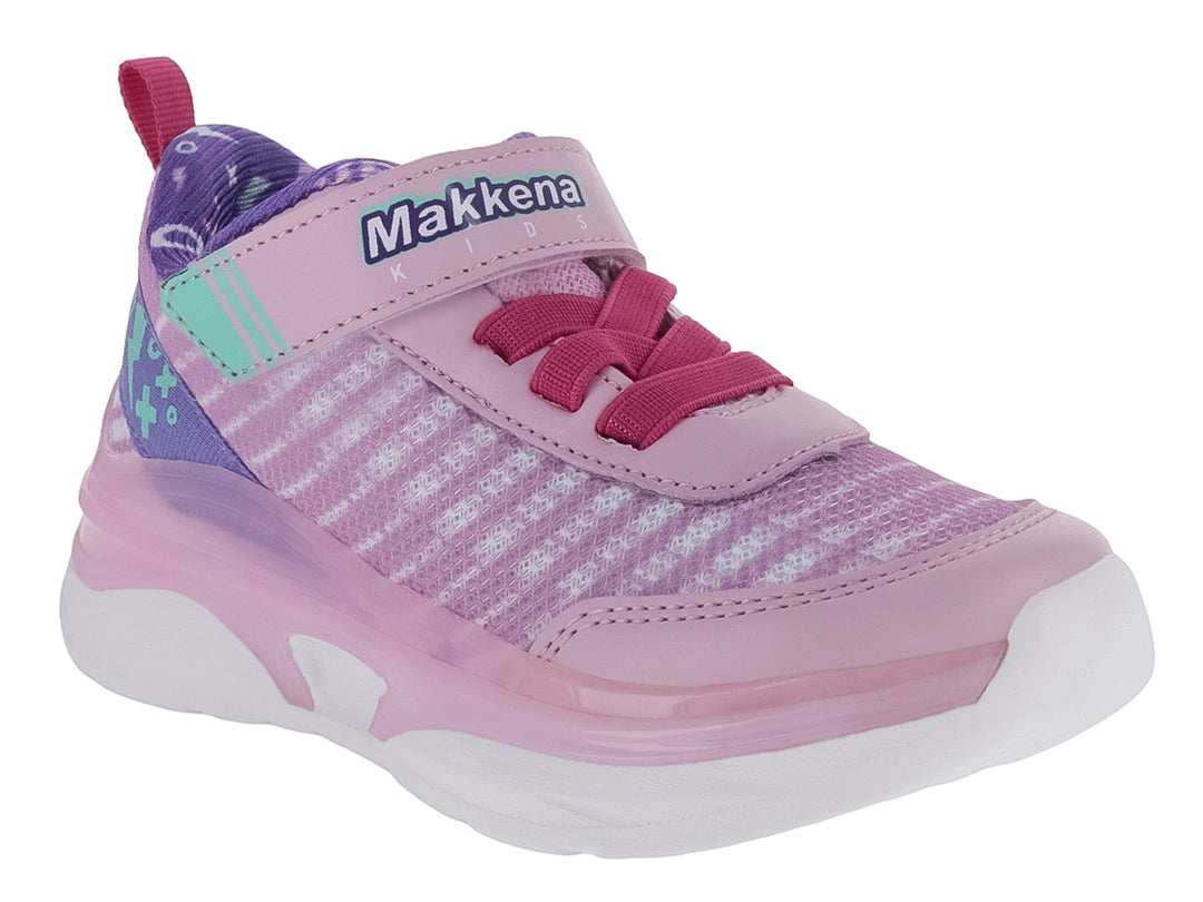 Zapato deportivo para niña marca Makena en color rosa uva con detalles blancos y verdes, suela blanca y cierre de velcro.