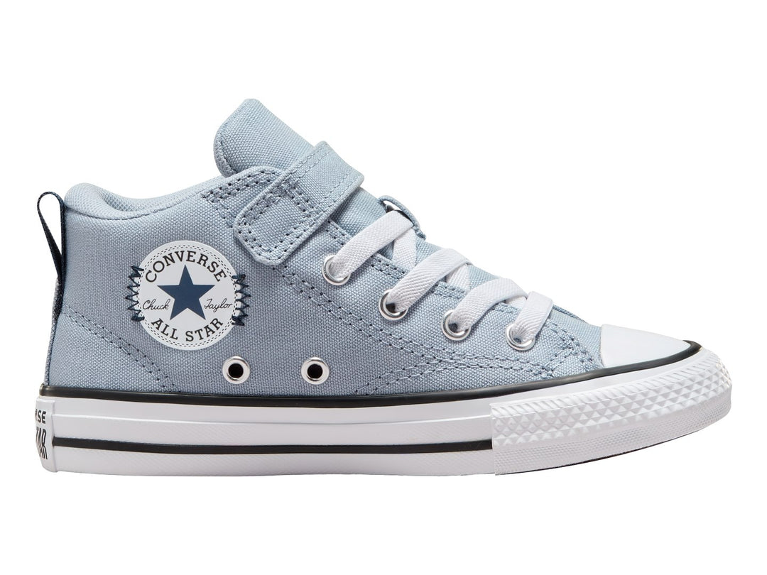 Tenis Converse Chuck Taylor All Star color azul claro con suela blanca y correa de velcro.