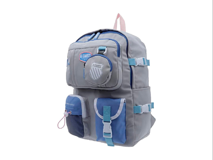 Mochila K-Swiss color gris claro con detalles en azul y rosa, ideal para uso escolar juvenil.
