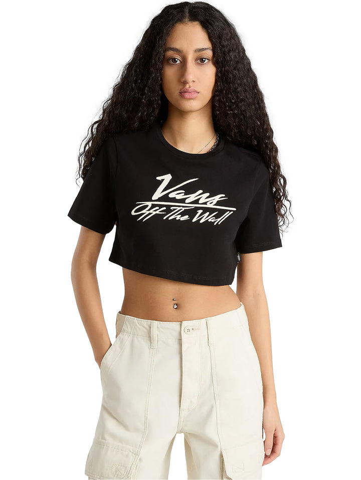 Camiseta crop top negra de marca Vans con logotipo blanco en el pecho.