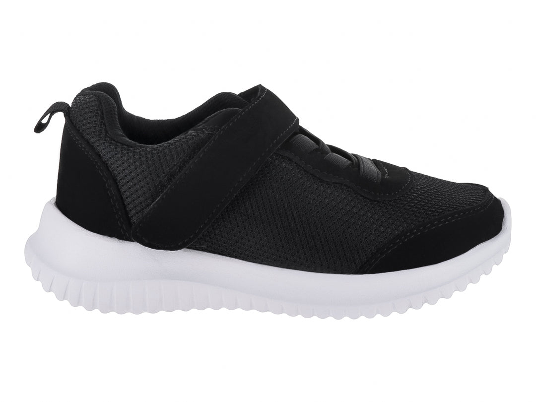 Zapato deportivo infantil color negro con suela blanca y cierre de velcro.