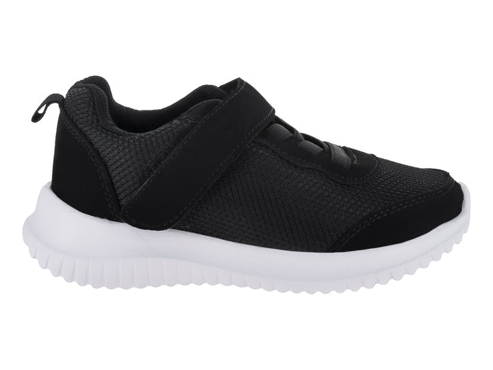 Zapato deportivo infantil color negro con suela blanca y cierre de velcro.