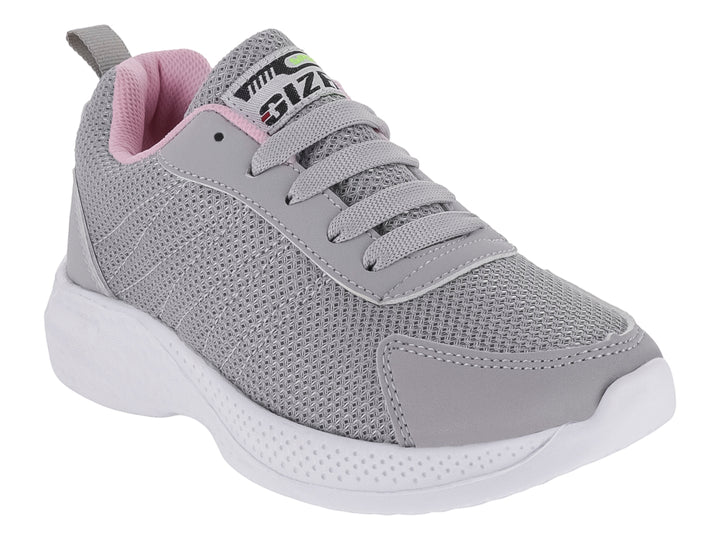 Tenis deportivos para niña en color gris con detalles en rosa y suela blanca.