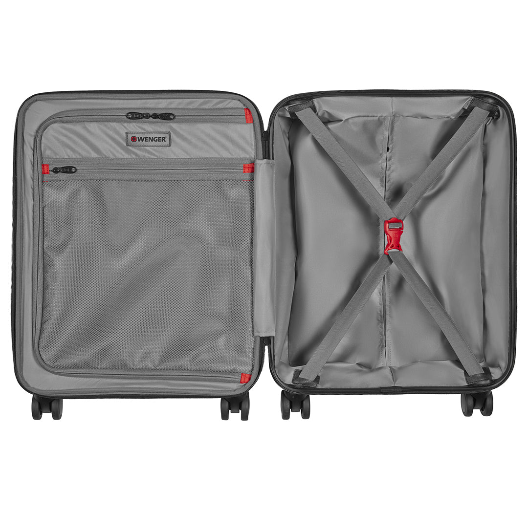 Maleta rígida de viaje color negro con asa extensible y ruedas, marca Wenger.