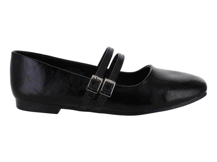 Zapato plano negro para niña con doble correa y hebillas plateadas sobre fondo blanco.