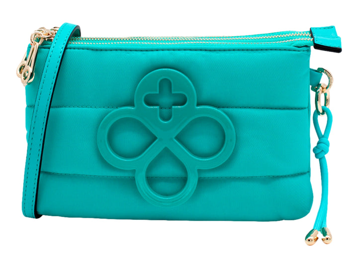 Bolsa crossbody Jaime Ibiza color aqua con diseño acolchado y detalle frontal en relieve.