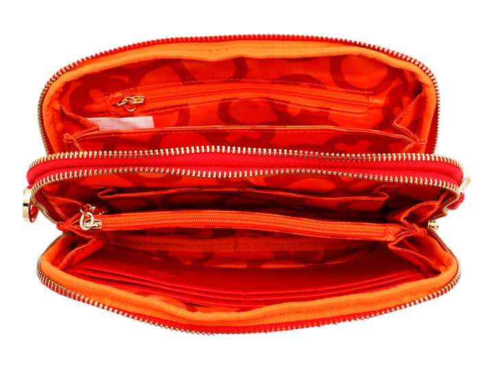 Cartera roja de Jaime Ibiza con diseño en relieve frontal y correa ajustable.