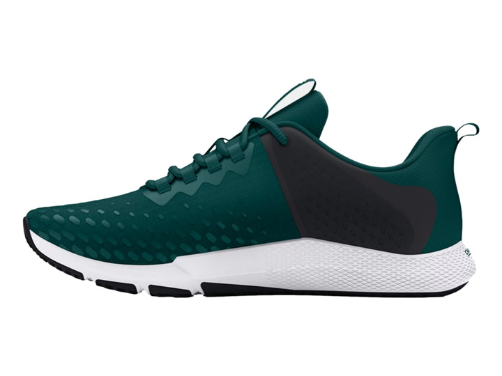 Tenis deportivos Under Armour color azul oscuro con suela blanca y detalles en verde lima.