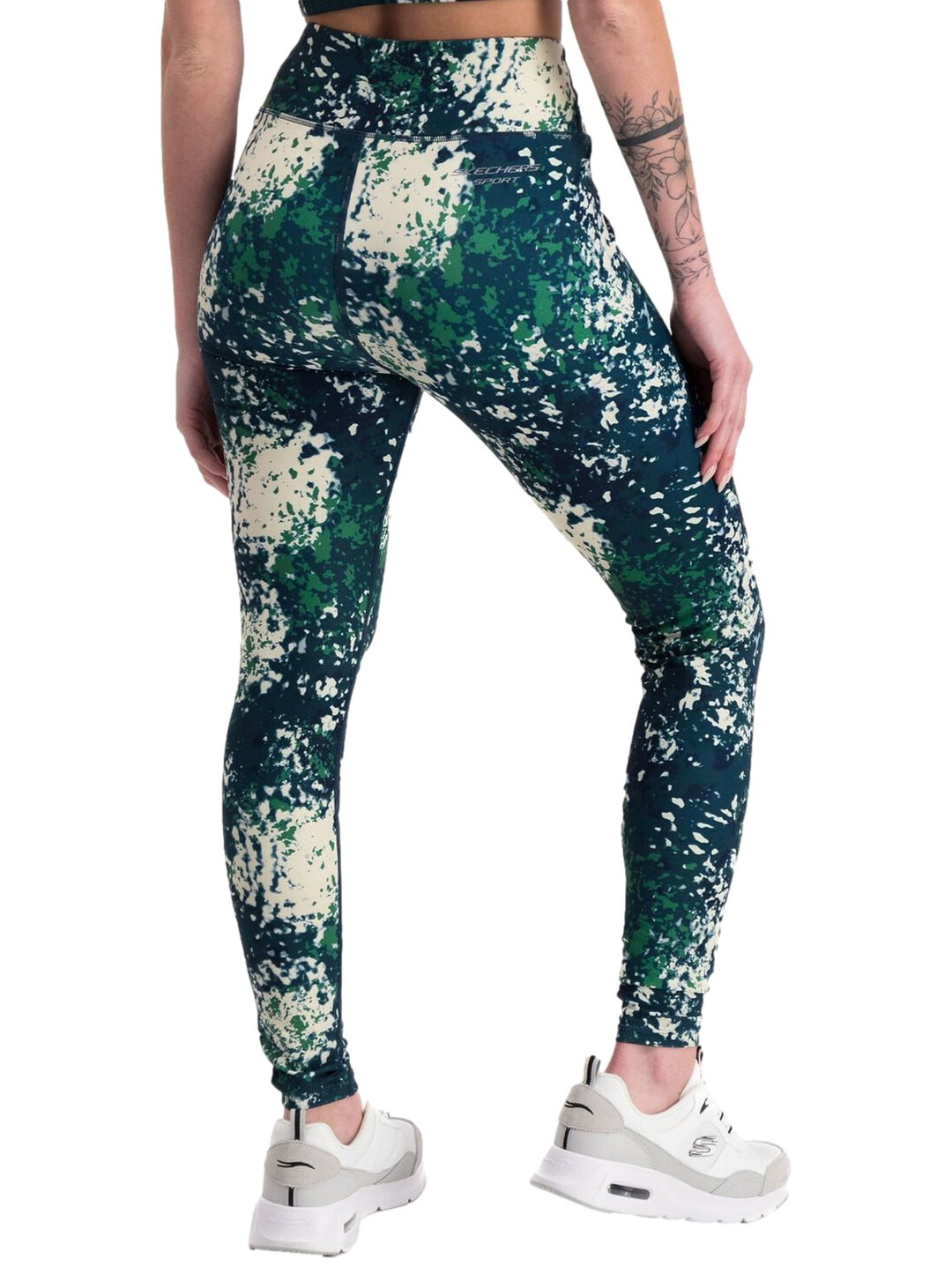 Leggings deportivos Skechers para Mujer con estampado abstracto en colores marino, verde y blanco.