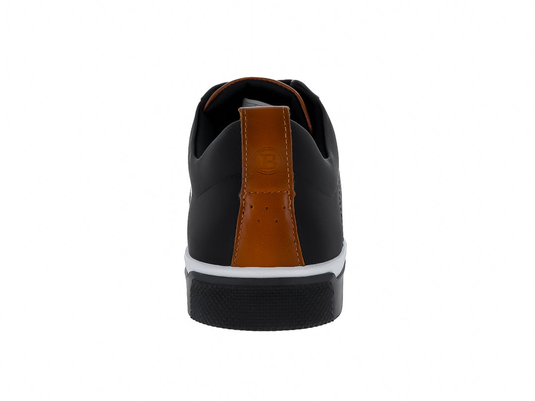 Zapato casual negro con suela blanca y detalles cafés en el talón y la lengüeta.