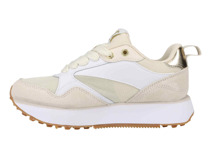 Tenis Champion en colores blanco y beige con detalles dorados y suela dentada color café.