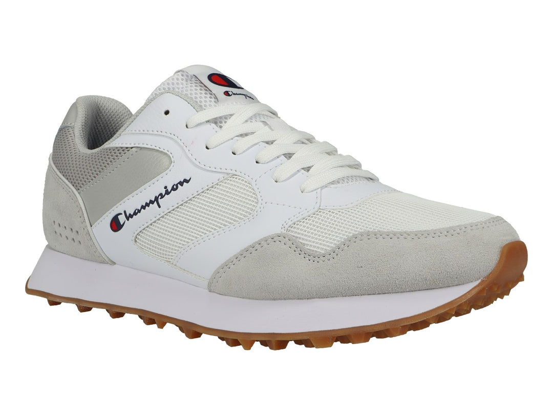 Tenis deportivos Champion en color blanco y gris con suela de goma café y detalles en malla.