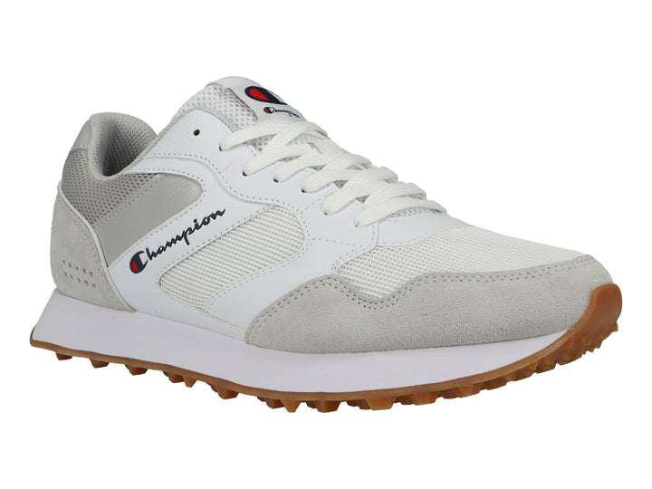 Tenis deportivos Champion en color blanco y gris con suela de goma café y detalles en malla.