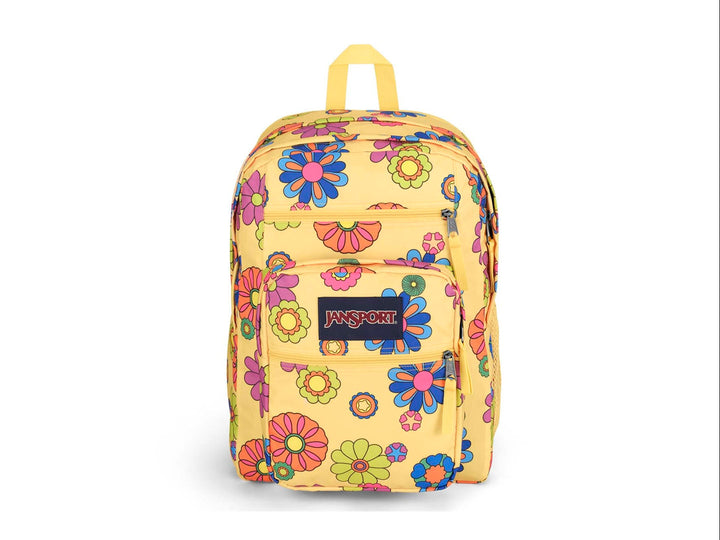 Mochila JanSport amarilla con estampado de flores multicolores en estilo retro y bolsillo frontal.