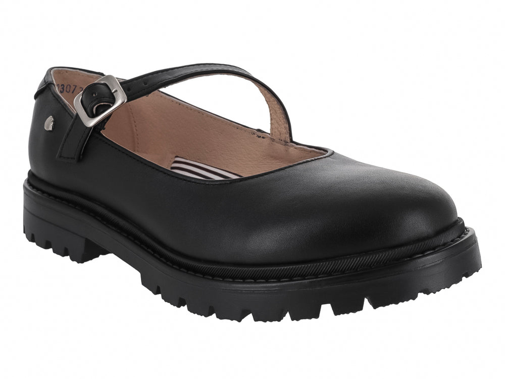 Zapato infantil Mary Jane de cuero negro con correa, hebilla plateada y suela gruesa dentada.