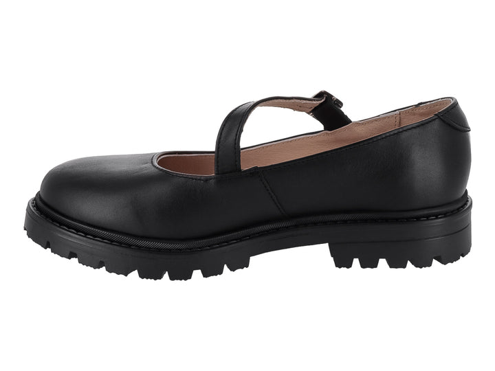 Zapato infantil Mary Jane de cuero negro con correa, hebilla plateada y suela gruesa dentada.