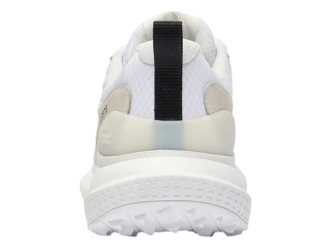 Tenis deportivos Lacoste color blanco con detalles en gris claro y suela blanca.
