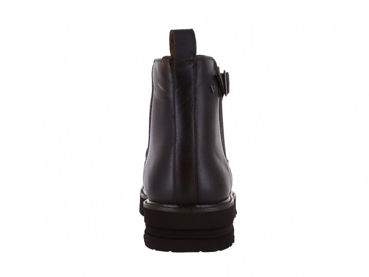 Bota de cuero color cognac con suela track y detalle de hebilla lateral.