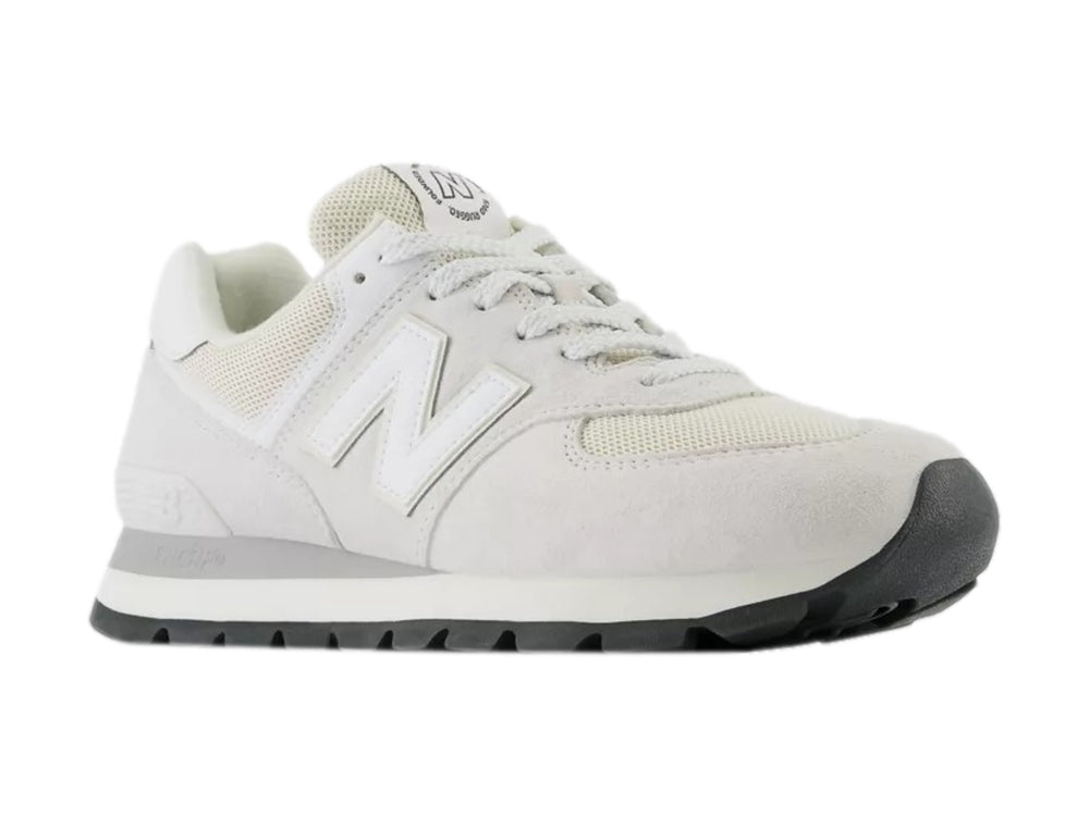 Tenis New Balance modelo 574 en color blanco y gris con detalles en gamuza y malla.