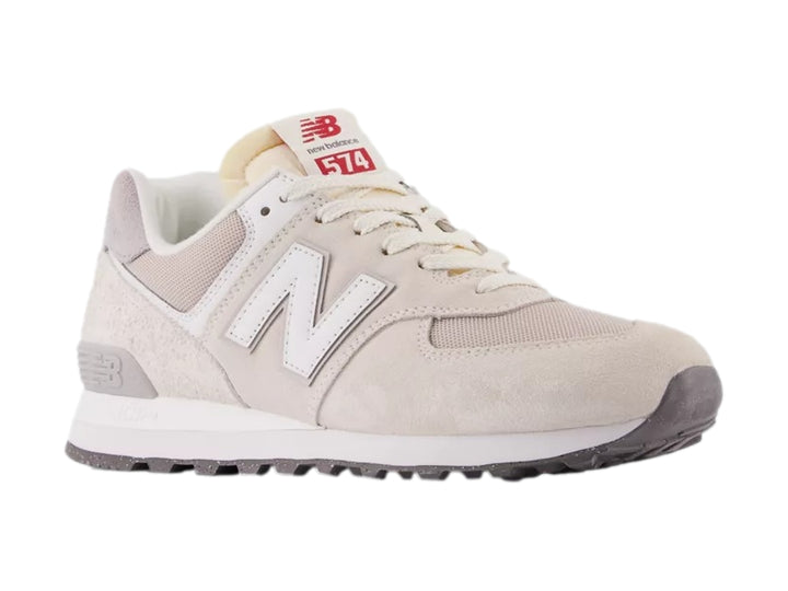 Tenis New Balance 574 en color gris alloy y blanco, vista lateral sobre fondo blanco.