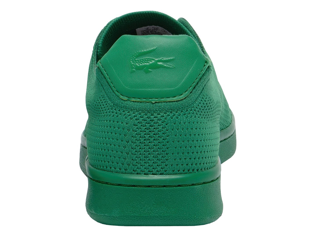Tenis Lacoste color verde con textura de piqué y suela a juego.