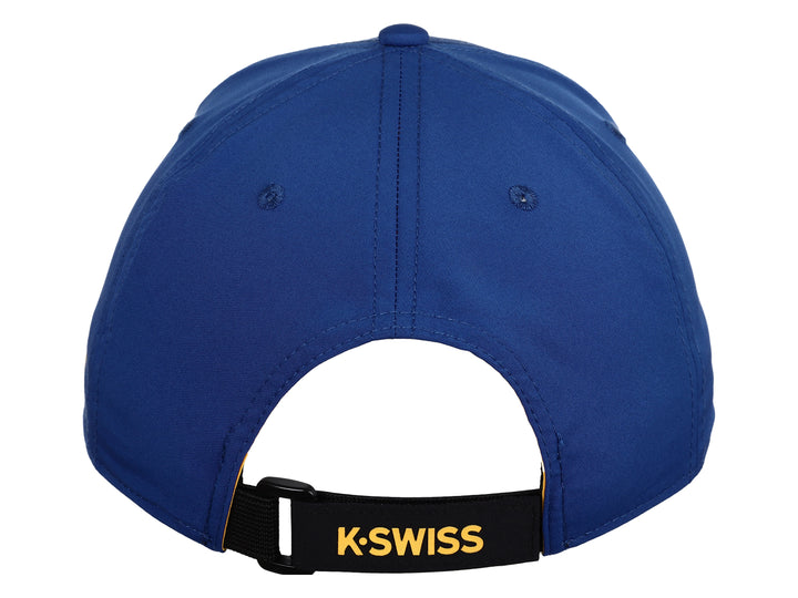 Gorra deportiva K-Swiss color azul con logotipo blanco frontal y detalles en amarillo en la visera y lateral.