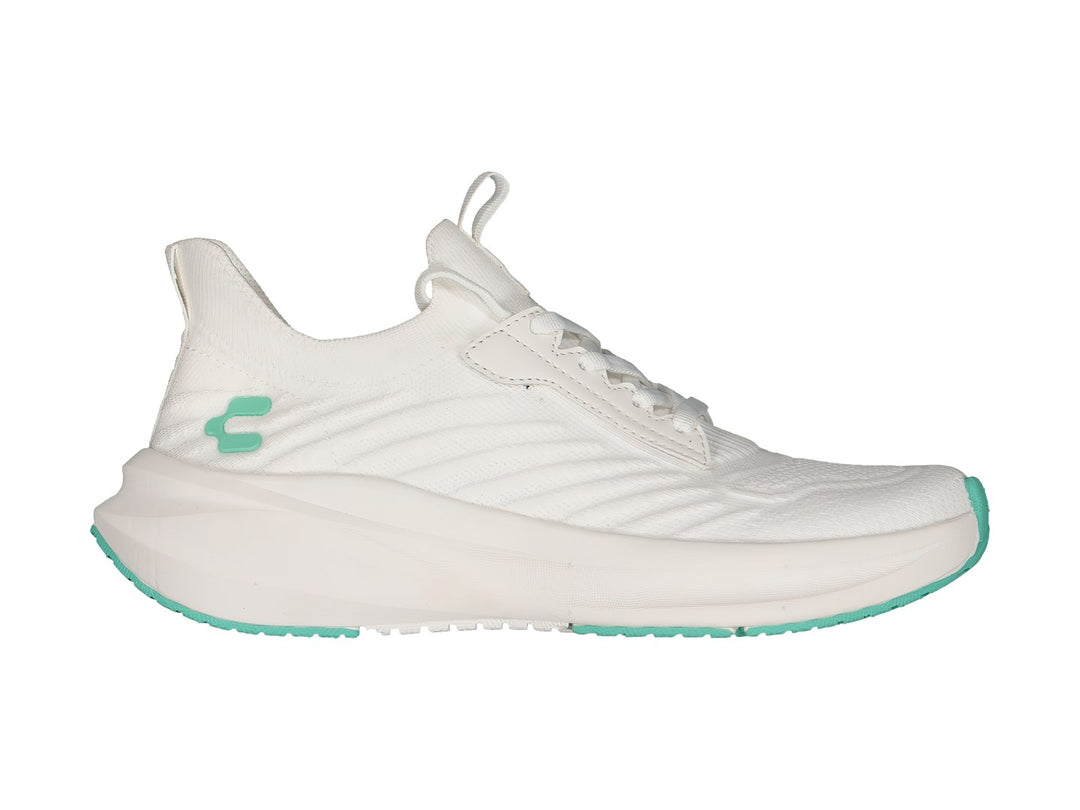 Tenis deportivos Charly color blanco con detalles en verde menta en la suela y logotipo.