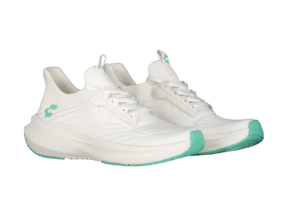 Tenis deportivos Charly color blanco con detalles en verde menta en la suela y logotipo.