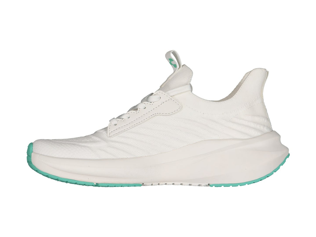 Tenis deportivos Charly color blanco con detalles en verde menta en la suela y logotipo.