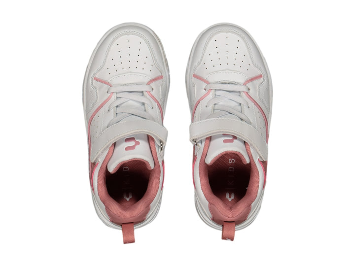 Tenis deportivos Charly para niña en color blanco con detalles en rosa y cierre de velcro.