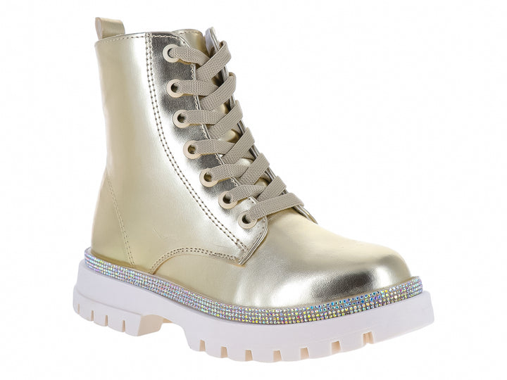 Bota dorada metálica con suela blanca track y detalle de glitter en la base.