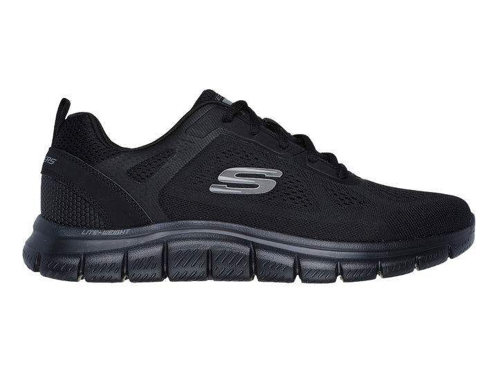Tenis deportivo Skechers color negro con suela flexible y parte superior de malla transpirable.