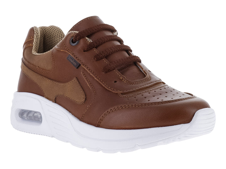 Tenis infantiles color miel con suela blanca y cordones.