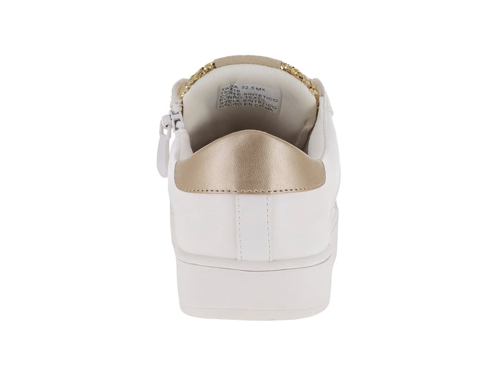 Tenis blancos para niños con punta y detalles en glitter dorado y una estrella en el costado.