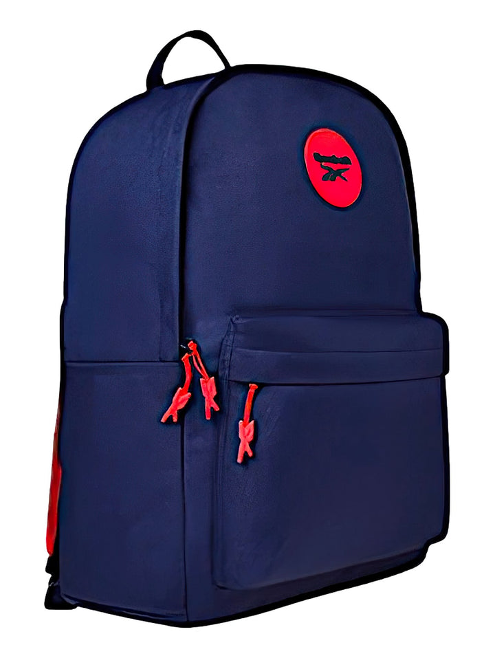 Mochila Reebok color azul marino con logotipo circular rojo en la parte superior y detalles en rojo.