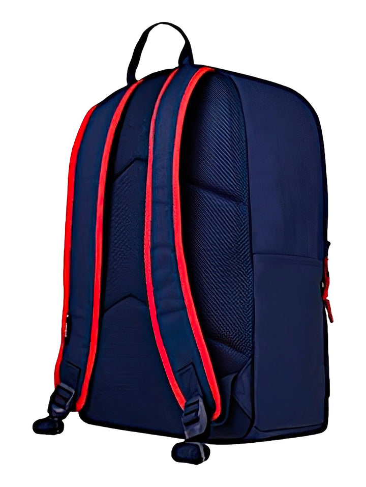 Mochila Reebok color azul marino con logotipo circular rojo en la parte superior y detalles en rojo.