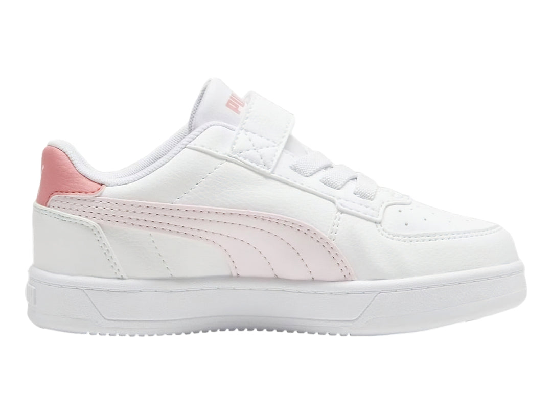 Tenis PUMA blancos con detalles en rosa y cierre de velcro para Niña.