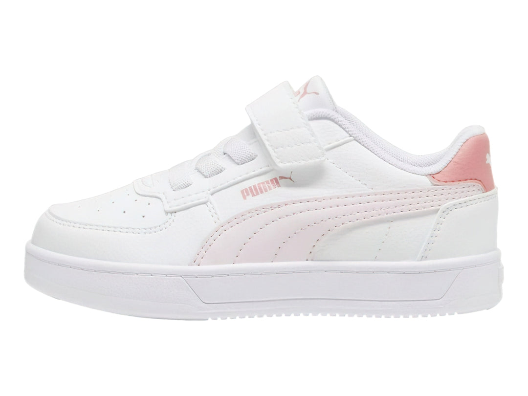 Tenis PUMA blancos con detalles en rosa y cierre de velcro para Niña.
